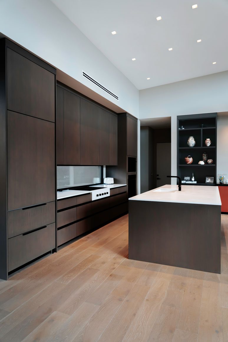 Contemporary kitchen cabinetry and prep counters with natural desert lighting